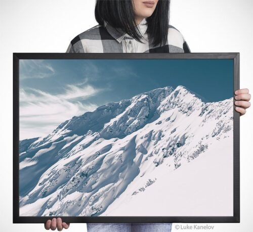 Snow covered mountain peak – Framed Canvas
