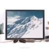 Snow covered mountain peak – Framed Canvas